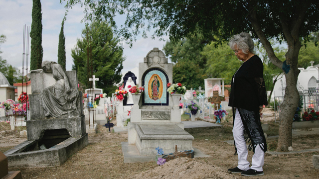 Sequoyah descendant Winnie Guess Perdue prays in Morelos cemetery, Coahuila, MX. Credit: Karl W. Schmidt